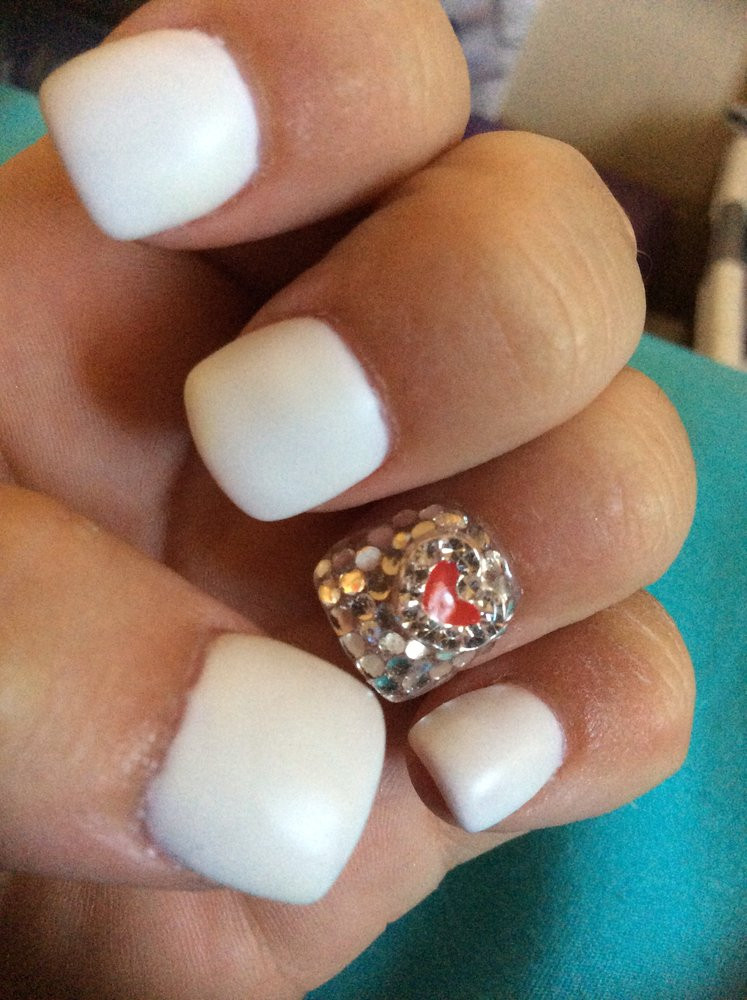Pretty White Nails
 Diamond covered accent nail with sealant white matte top