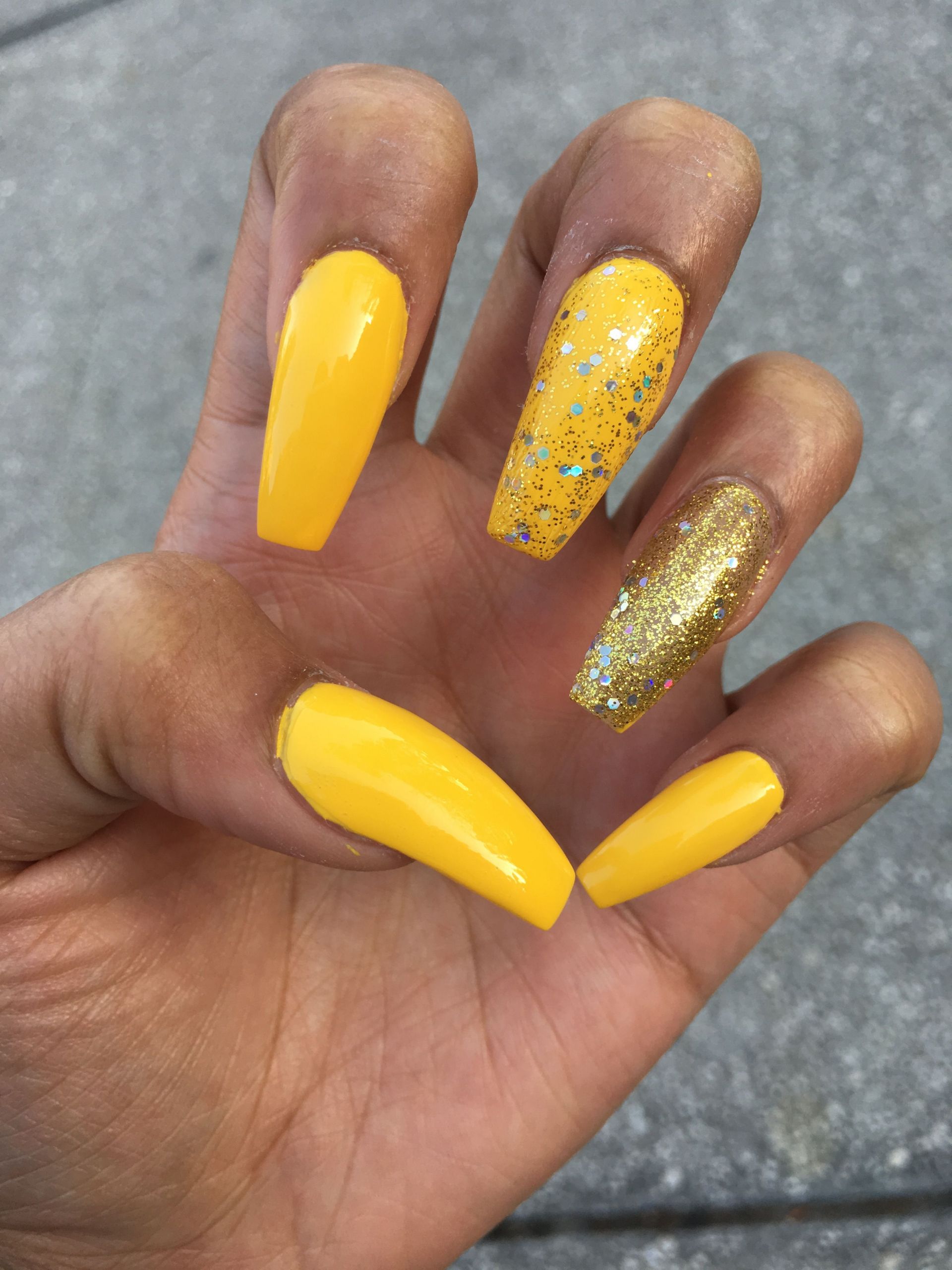 Pretty Yellow Nails
 yellow & gold coffin nails the yellow is to for