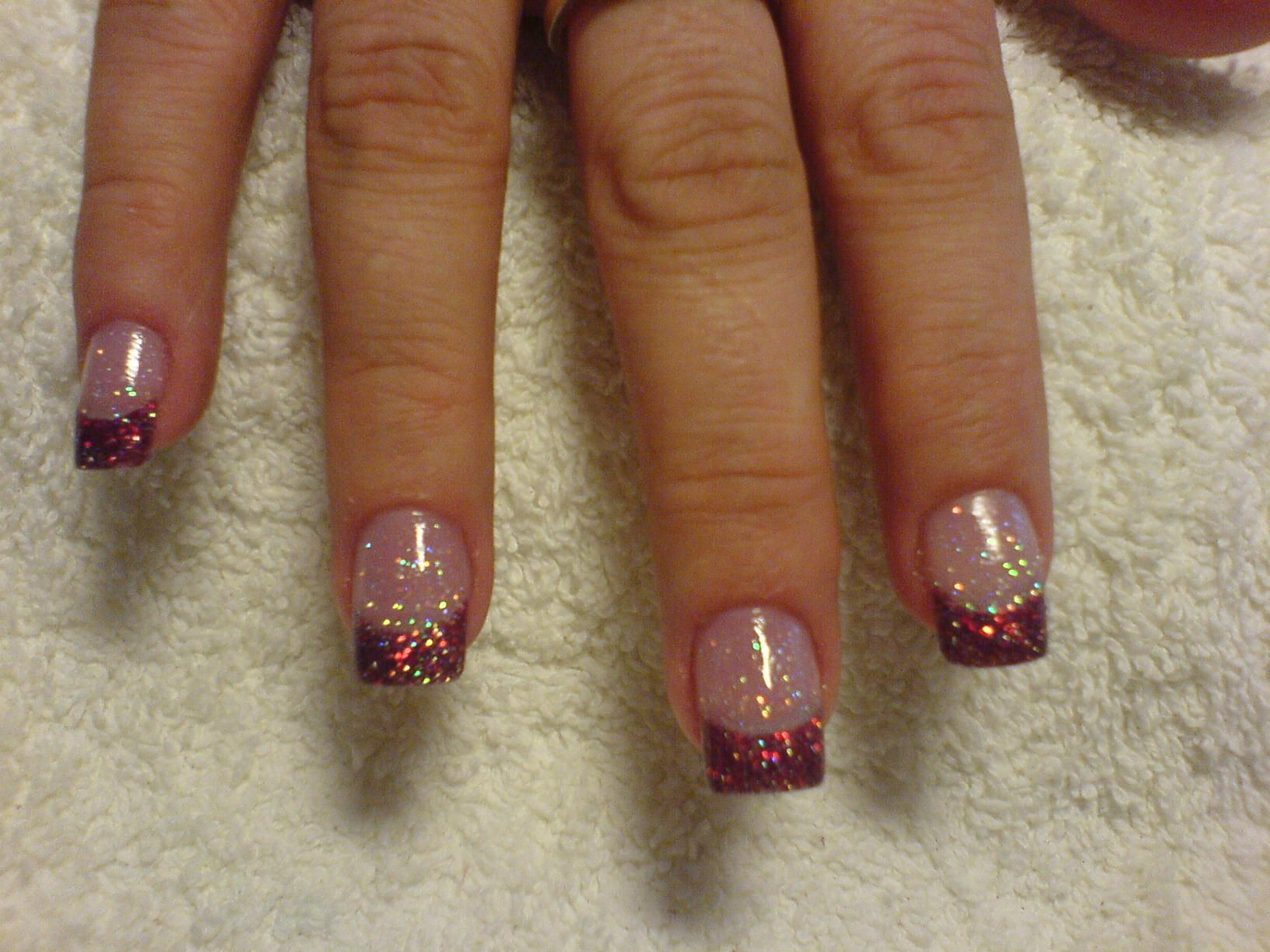 Red Glitter Tips Nails
 Red glitter Christmas nails possibly