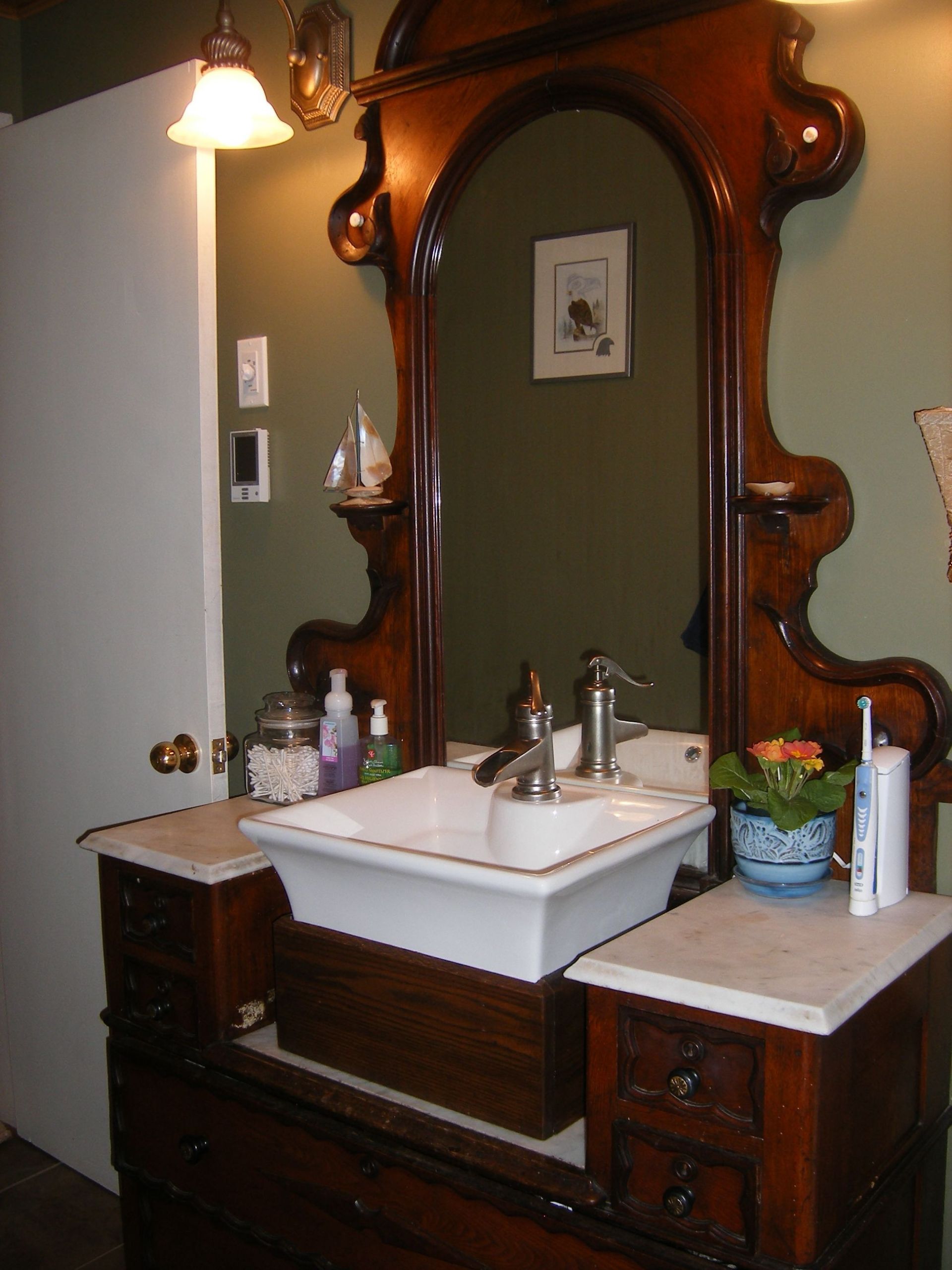 Repurposed Bathroom Vanities
 1800 s dresser repurposed as our original bathroom