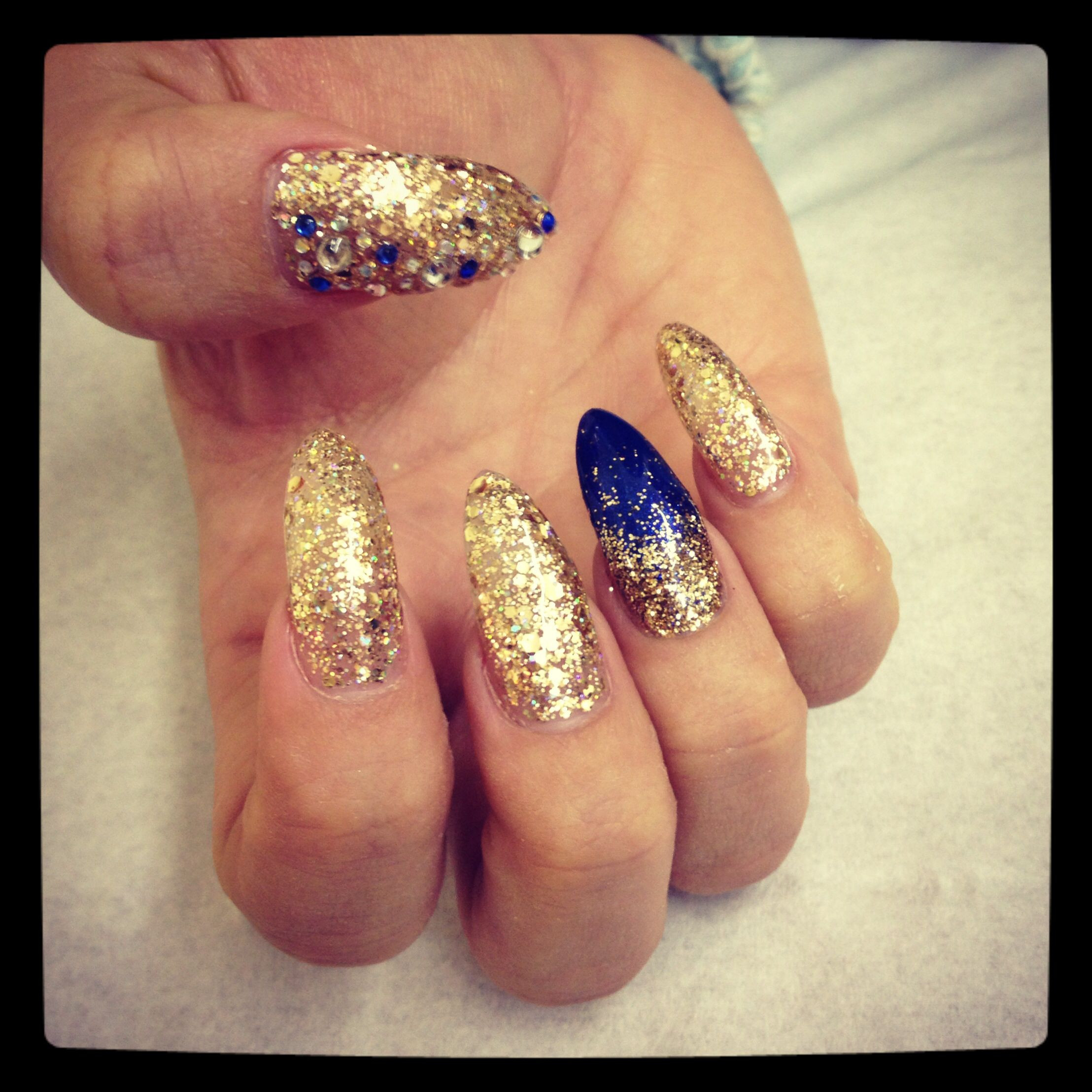 Royal Blue And Gold Nail Designs
 Gold and royal blue glitter and diamonds