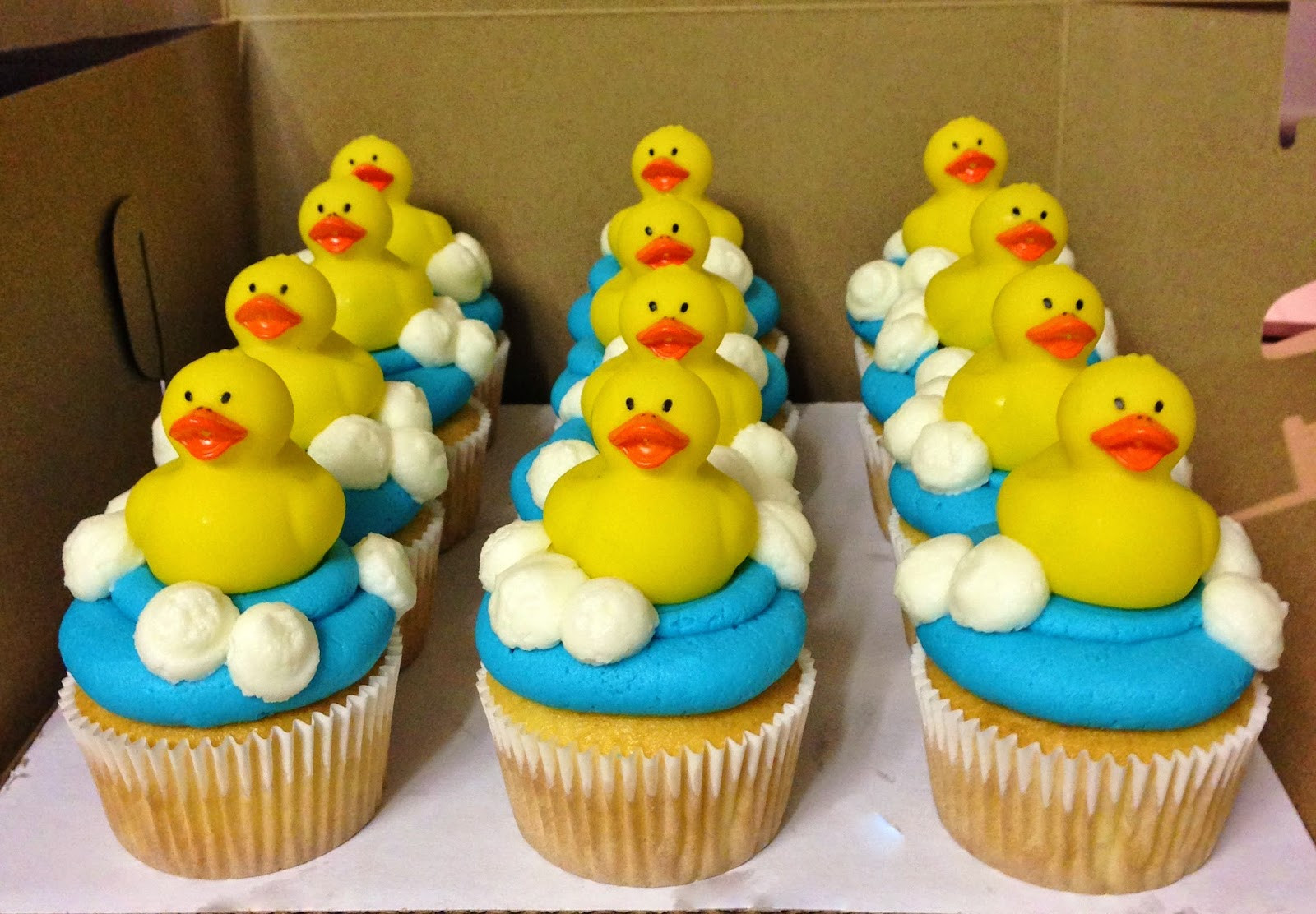Rubber Duckie Cupcakes
 Cakes by Mindy Rubber Ducky Gender Reveal Cake 10" and