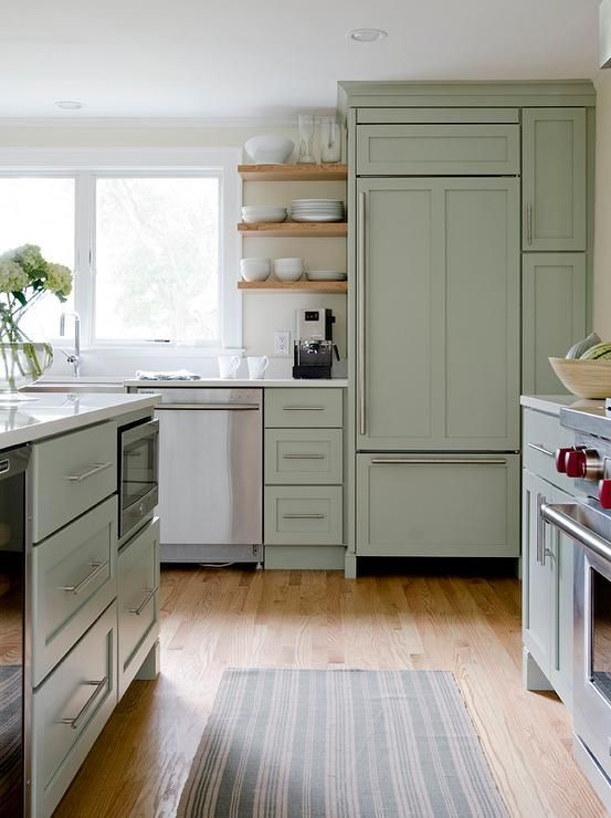 Sage Green Kitchen Walls
 Beautiful kitchen features sage green cabinets paired with