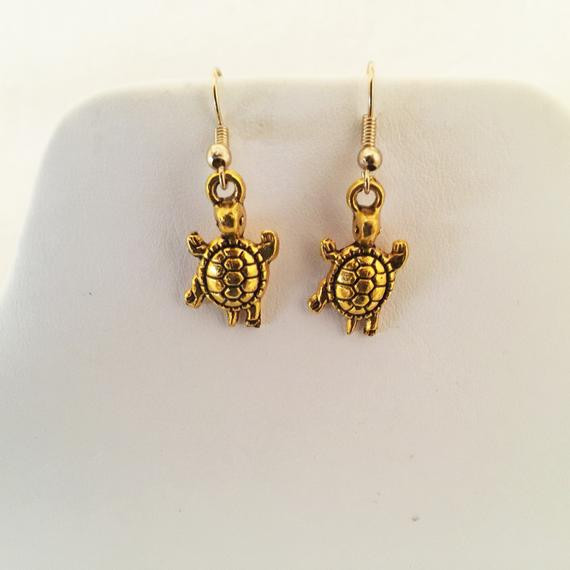 Sea Turtle Earrings
 Sea Turtle Gold Tone Pierced Earrings by cbfcreationsHB on