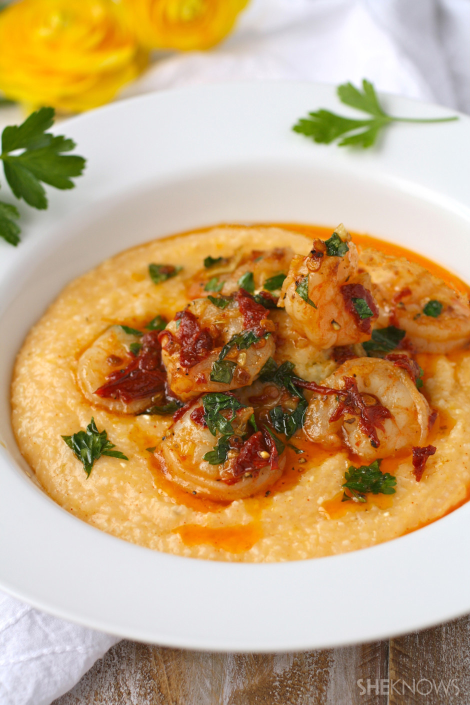 Shrimp And Cheddar Grits
 Sunday dinner Cheesy shrimp and grits