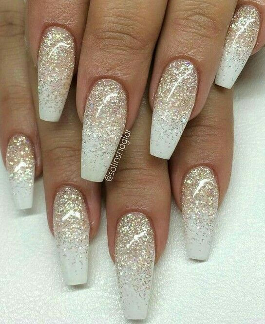 Silver Glitter Tip Nails
 Coffin shaped white ivory color with gold sparkles