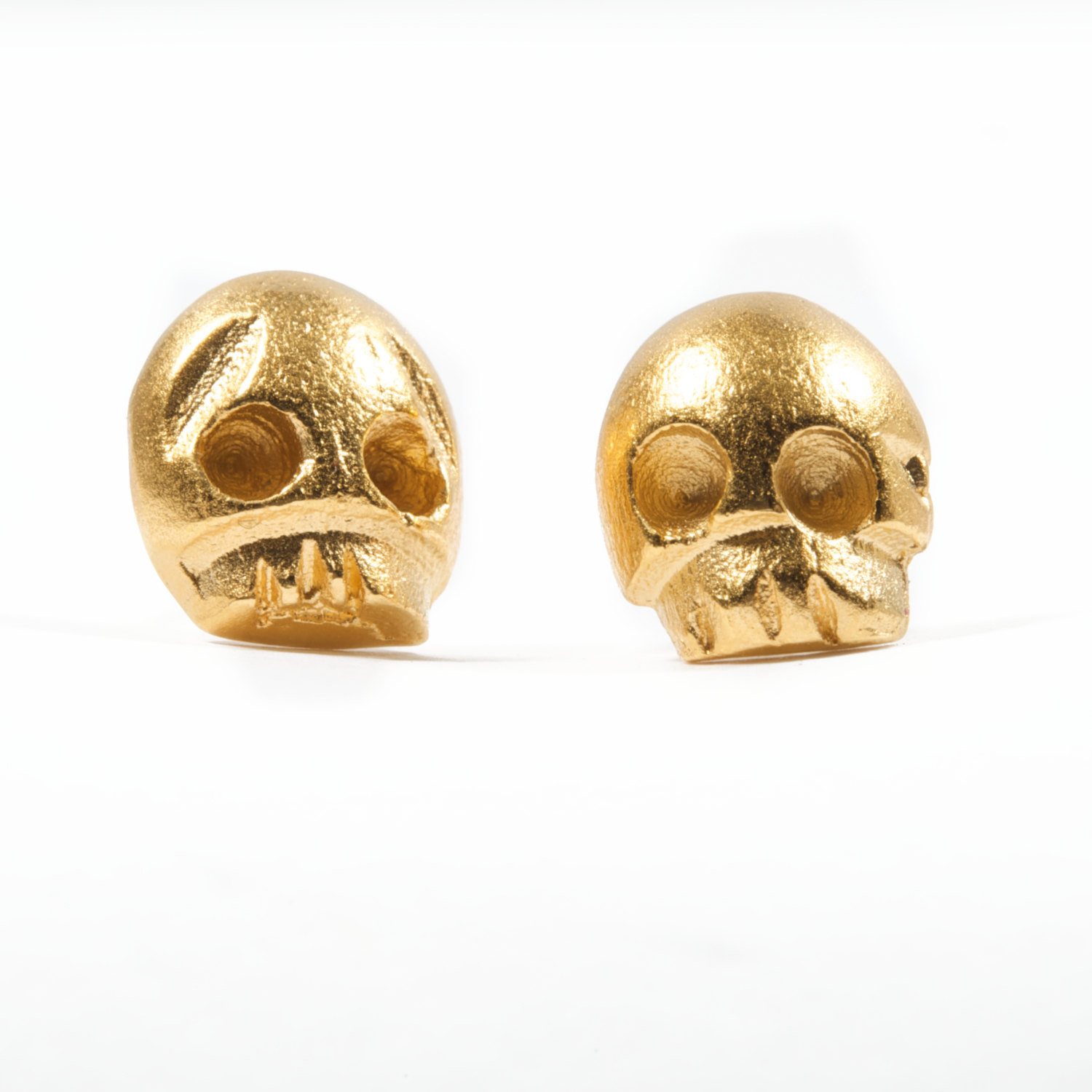 Skull Stud Earrings
 Gold Skull Stud Earrings by fisforfrank on Etsy