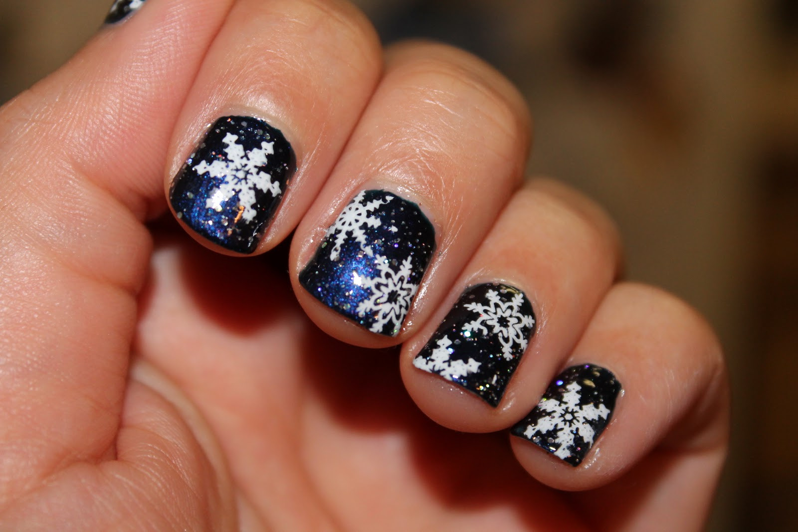 Snow Nail Designs
 Nails The Go by Nicole Snowflake Christmas Nails