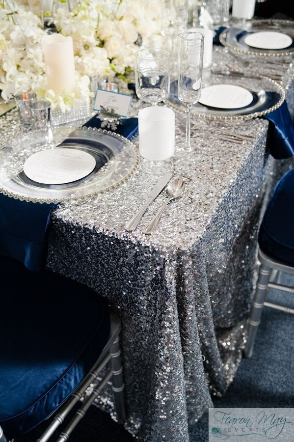 Sweet 16 Dinner Party Ideas
 Beautiful silver sequin table cloth with navy blue accents