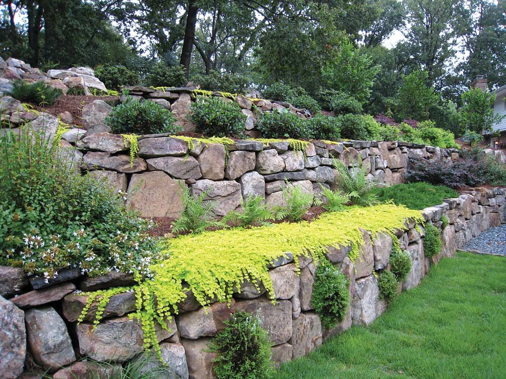 Terrace Landscape With Boulders
 Retaining walls expand landscaping options