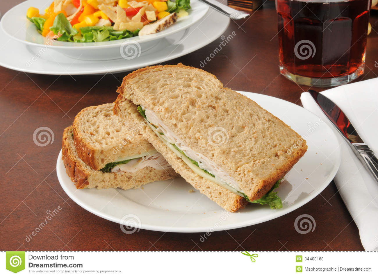 Turkey And Swiss Sandwiches
 Turkey And Swiss Sandwich With A Salad Stock Image
