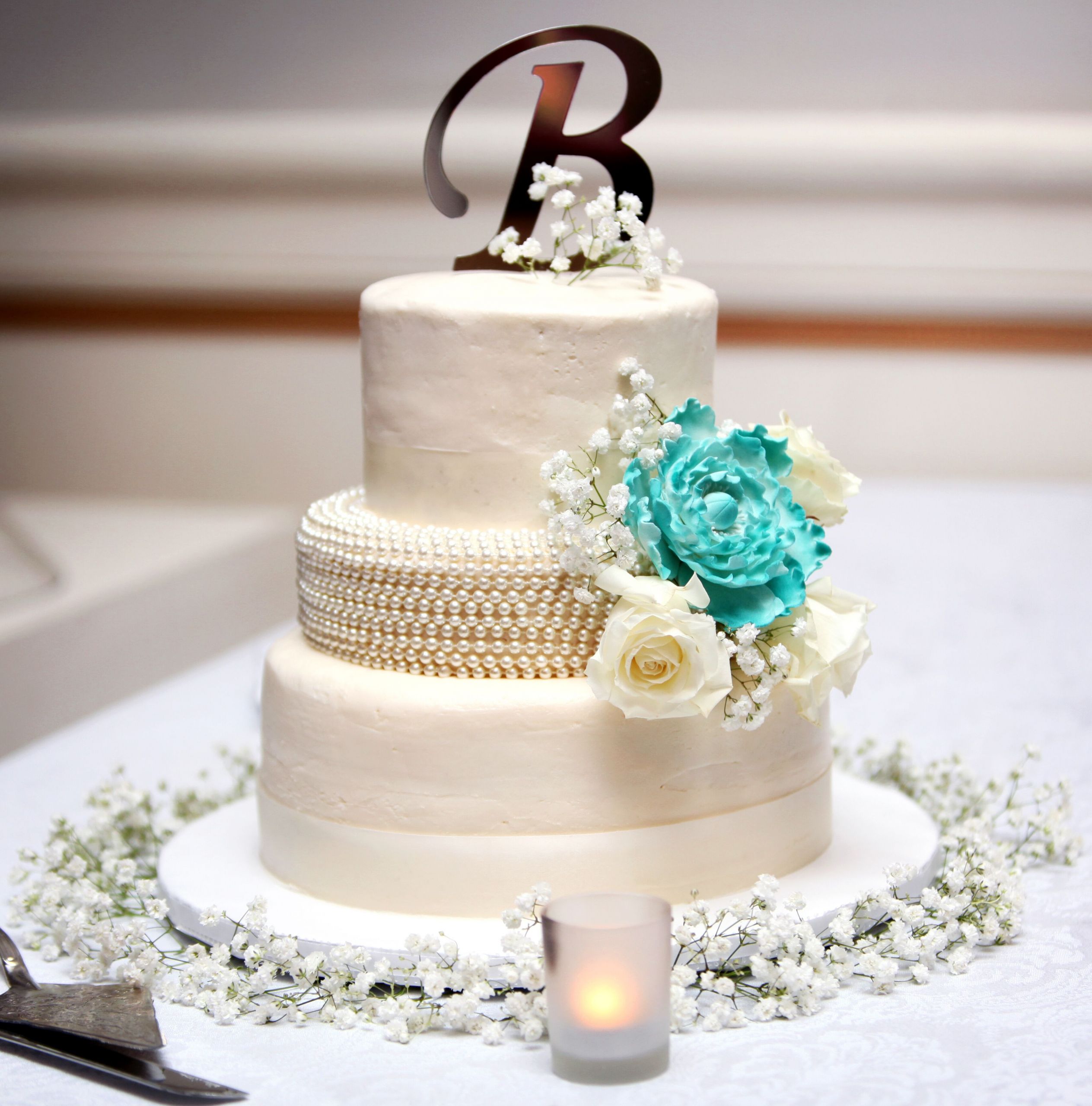 Turquoise Wedding Cake
 White Wedding Cake With Teal Cake Flower