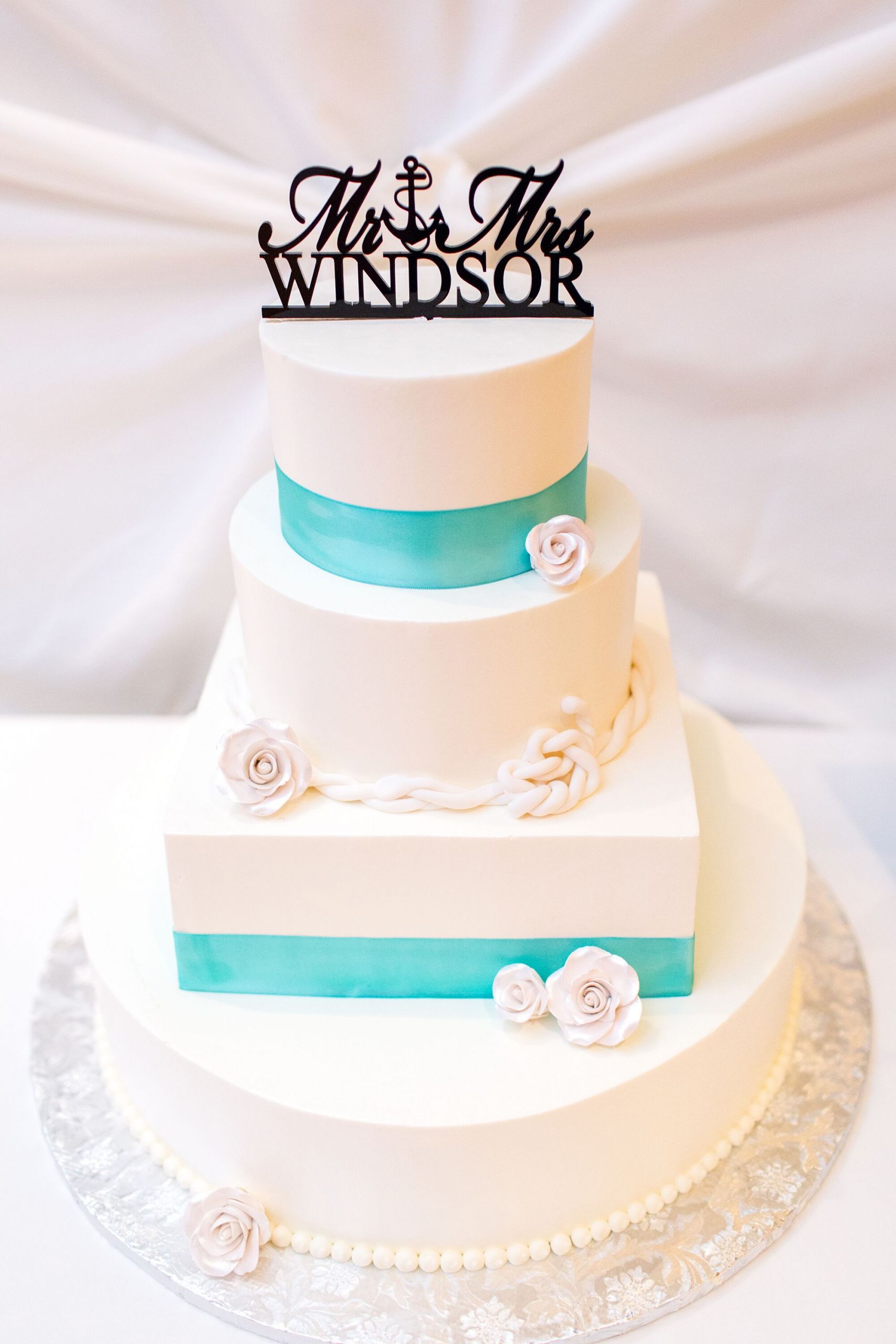 Turquoise Wedding Cake
 White Wedding Cake With Turquoise Ribbon
