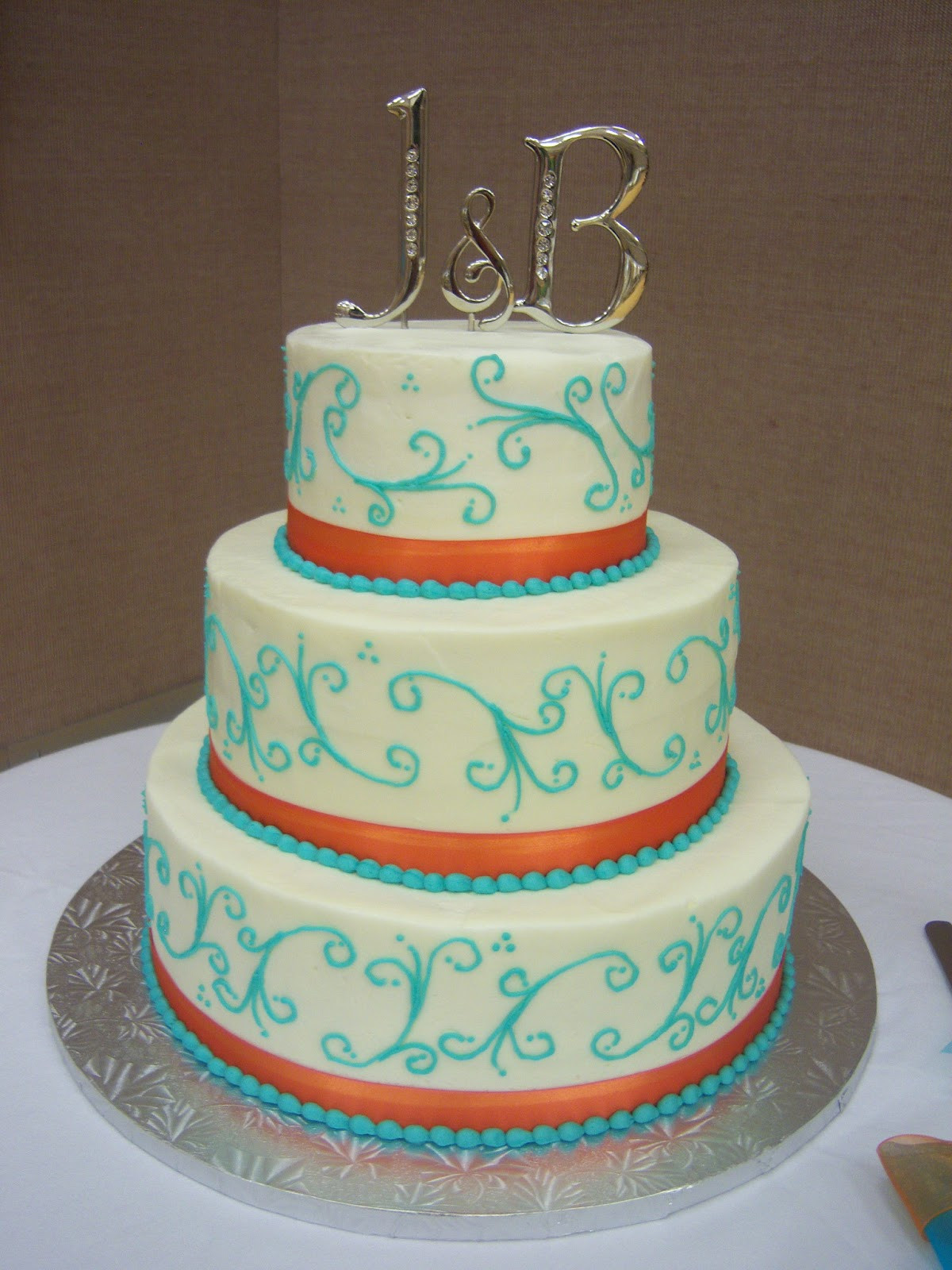 Turquoise Wedding Cake
 Creative Cakes By Angela Turquoise and Orange Wedding Cake
