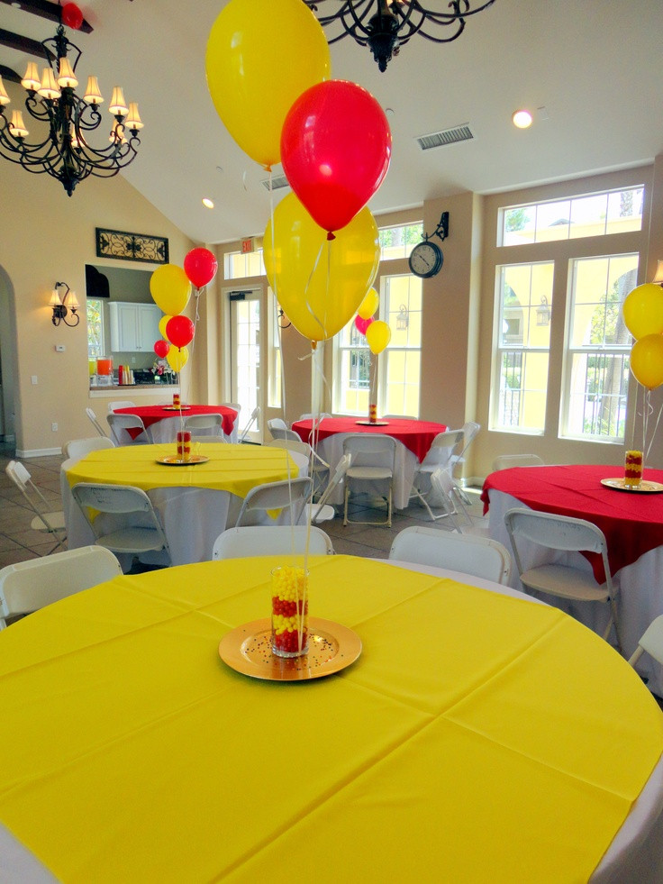 Usc Graduation Party Ideas
 Alternated red and yellow table cloth overlays