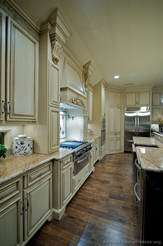 White Distressed Kitchen Cabinets
 My favorite anitque white distressed cabinets hood dark