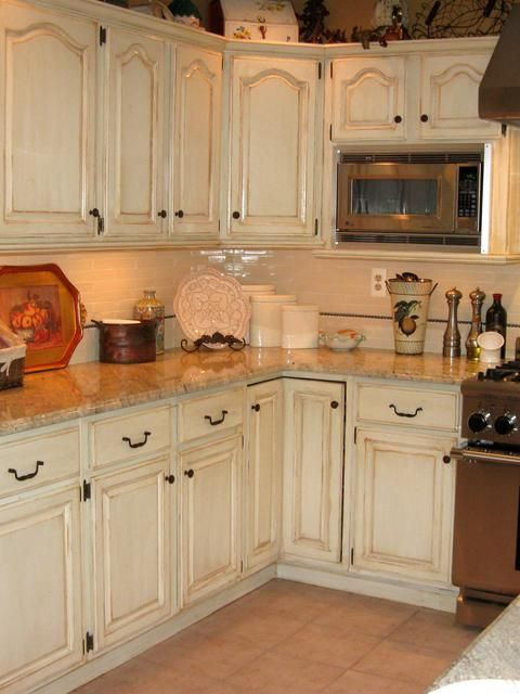 White Distressed Kitchen Cabinets
 hand painted and distressed kitchen cabinets Similar to
