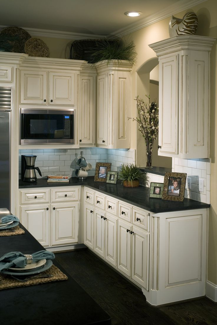 White Distressed Kitchen Cabinets
 LOVE THE DISTRESSED LOOK OF THESE CABINETS