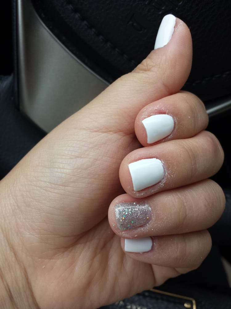 White Glitter Gel Nails
 White with one glitter gel nails for $20 Yelp