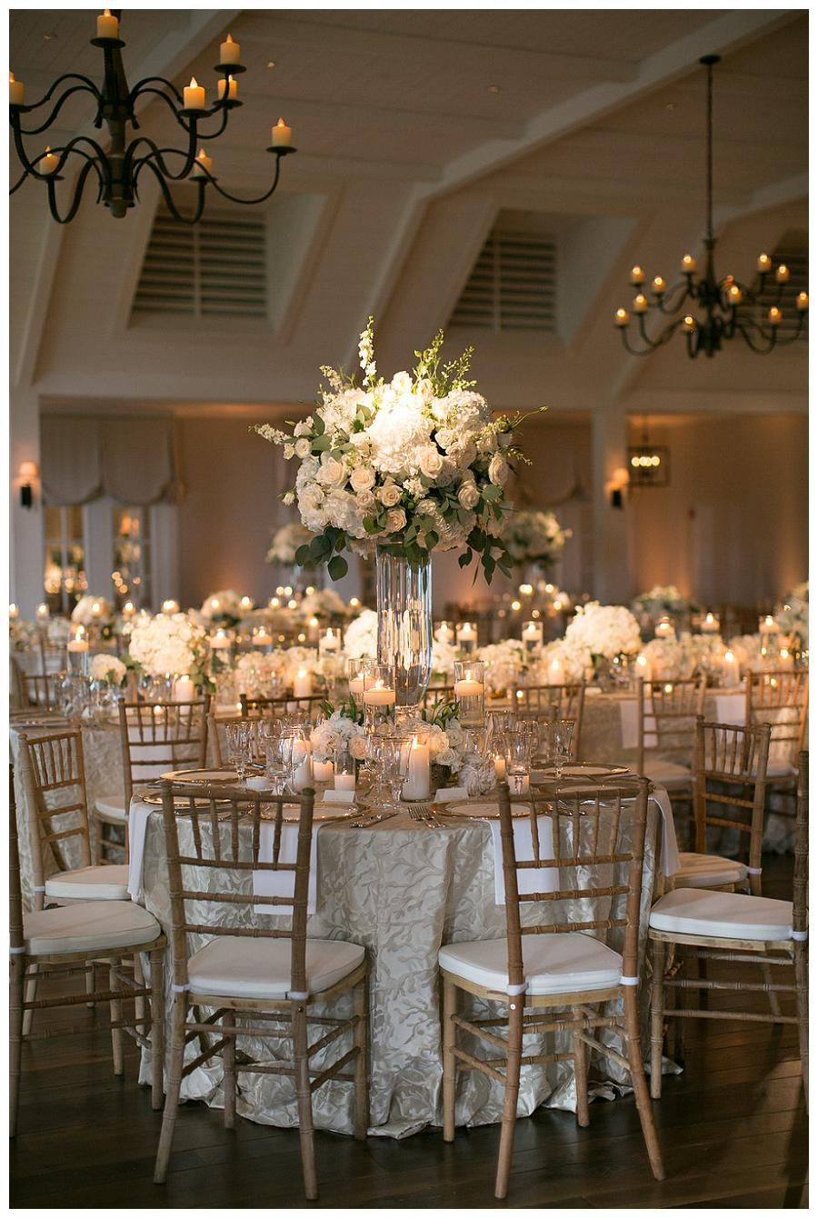 White Wedding Decorations
 Gold ivory and white wedding reception decor with white