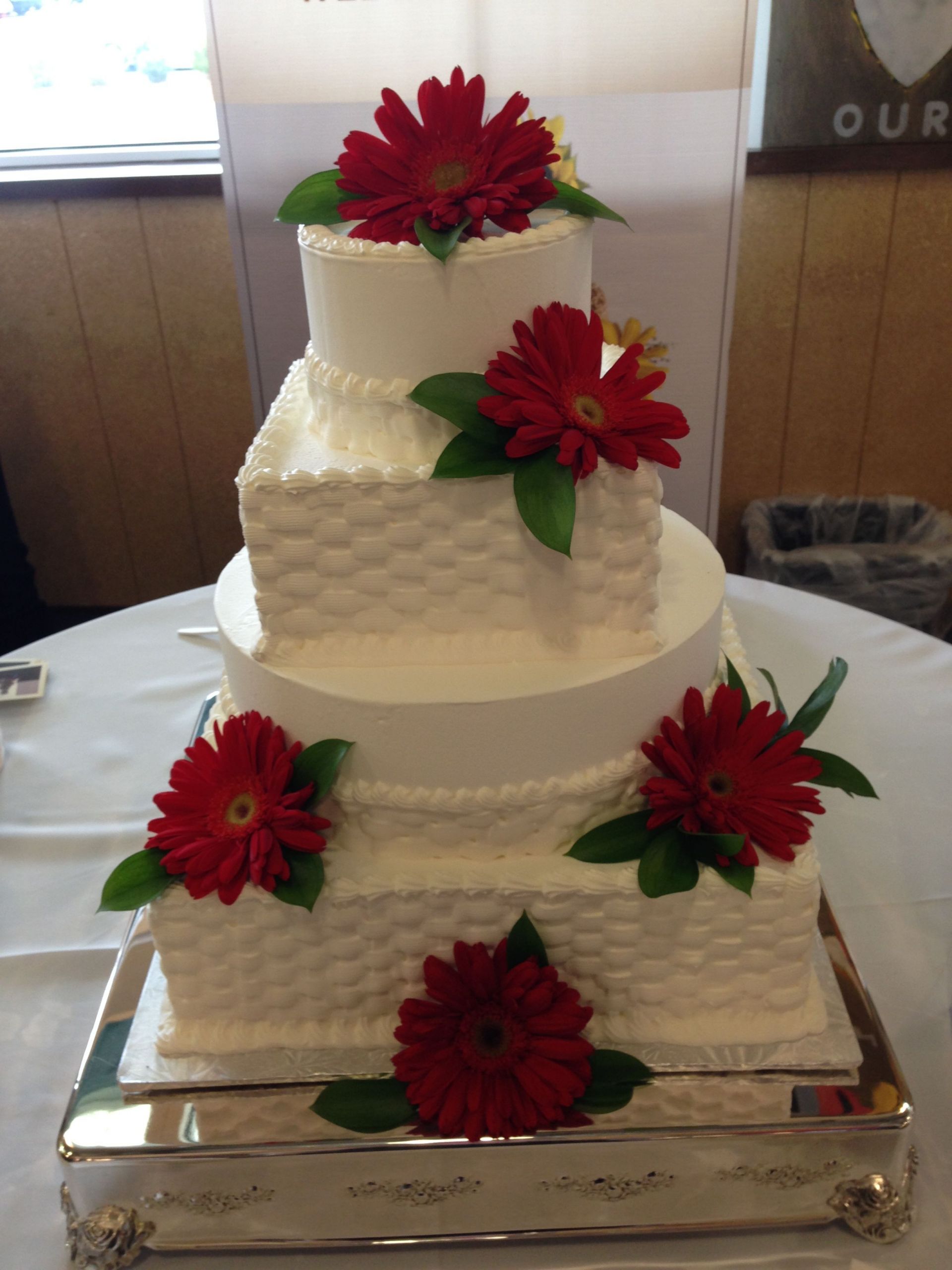 Whole Foods Wedding Cake
 Whole Foods Market wedding cake red daisies