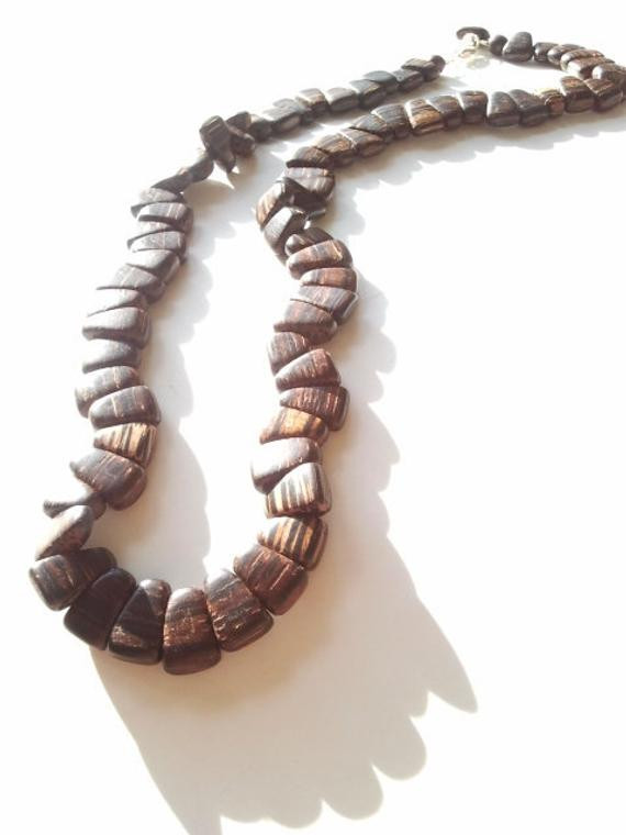 Wooden African Necklace
 Men s African wood beaded necklace The Jhoni