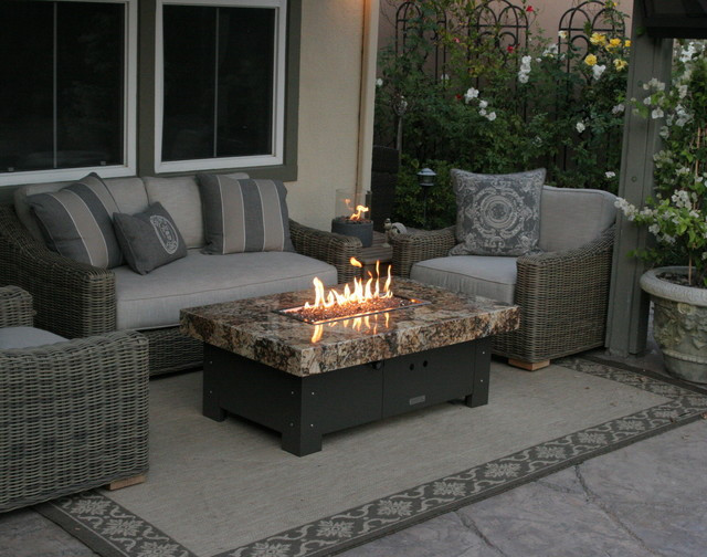 Outdoor Furniture With Fire Pits
 Balboa Fire pit table by COOKE Eclectic Patio orange
