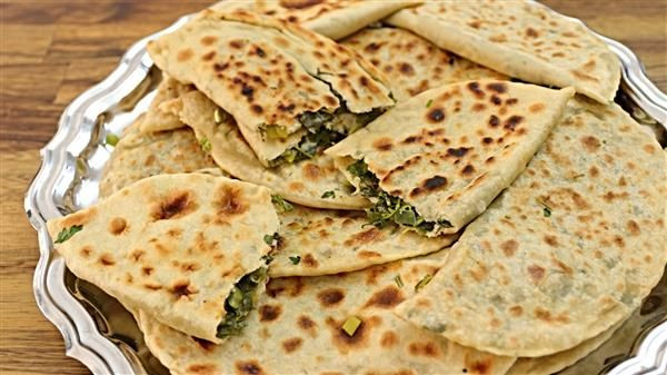 Middle Eastern Flat Bread Recipes
 Qutab Recipe Flat Bread Filled With Green ion and
